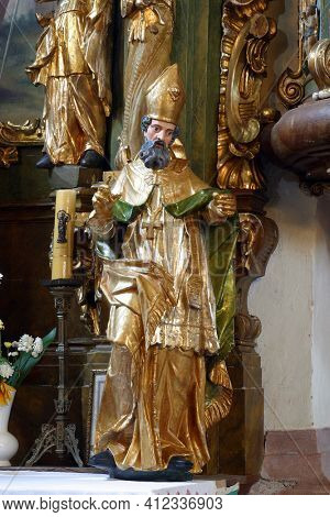 SVETI PETAR MREZNICKI, CROATIA - JULY 14, 2013: St. Nicholas, statue on the altar of st. Barbara at St. Peter's Parish Church in Sveti Petar Mreznicki, Croatia