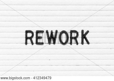 Black Color Letter In Word Rework On White Felt Board Background