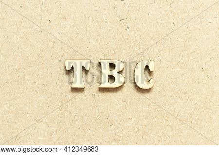 Alphabet Letter In Word Tbc (abbreviation Of To Be Confirmed Or Continued) On Wood Background