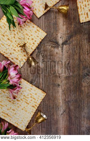 Jewish Matzah Bread On Wooden Rustic Background. Passover Holiday Concept