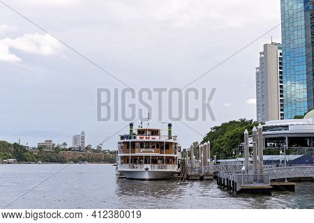 Brisbane, Queensland, Australia - March 2021: Showboat Cruise Docked At River Wharf