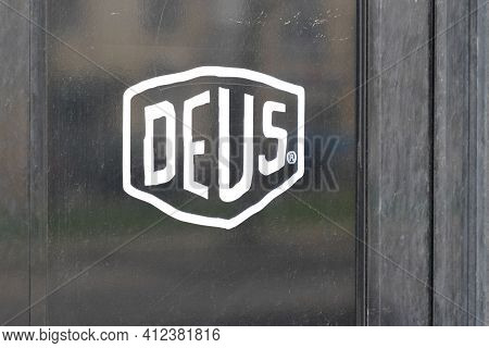 Bordeaux , Aquitaine France - 03 08 2021 : Deus Logo And Sign Front Of Fashion Clothes Motorbike Con