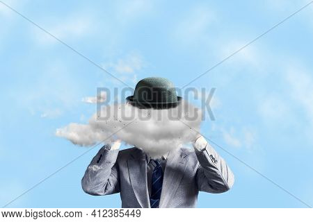 Businessman In A Hat, With A Cloud Instead Of A Head, With Arms Raised. The Concept Of Tough Decisio