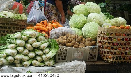 Mustard Greens, Carrots, Potatoes, Cabbage And Tomatoes In Traditional Markets