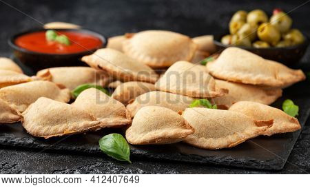 Margarita Margherita Pizza Parcels Pockets Filled With Tomato, Mozzarella Cheese And Basil Served On
