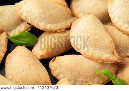 Margarita Margherita Pizza Parcels Pockets Filled With Tomato, Mozzarella Cheese And Basil Served On