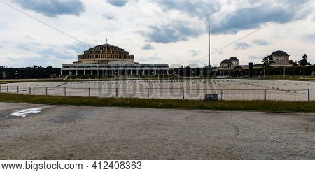 Wroclaw, Poland - May 13 2020: Big Old Centennial Hall Building Behind Big Fountain With Green Pergo
