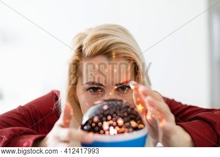 A Fortune Teller Gazes Into Her Ball