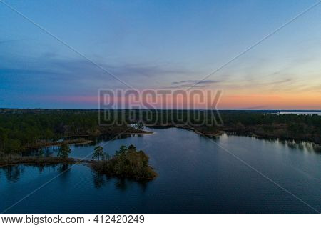 Aerial View Of Big Creek Lake In Semmes, Alabama At Sunset