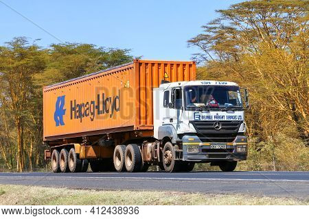 Nakuru County, Kenya - January 31, 2021: White Semitrailer Truck Mercedes-benz Axor 1840 At The Inte