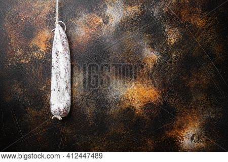 Spanish Dry Salami Longaniza On Old Metall Background With Space For Text.