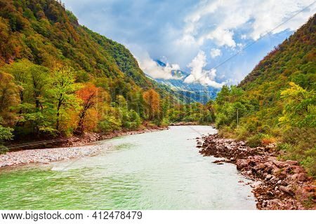 Bzyb River And Caucasus Mountains Autumn Landscape. Bzyb River Flows Near Blue And Ritsa Lake In Abk