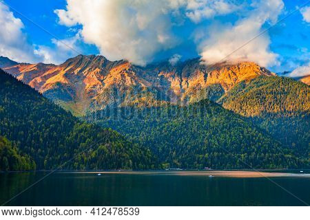 Lake Ritsa Panoramic View At Sunset. Lake Ritsa Is A Lake In The Caucasus Mountains In Abkhazia Regi