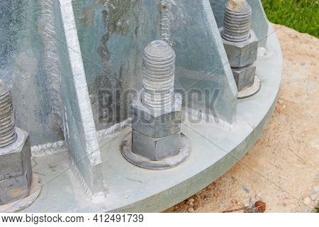 Light Pole Base Nut And Bolt On Concrete Floor. Galvanize Nut And Bolt In Electric Industrial