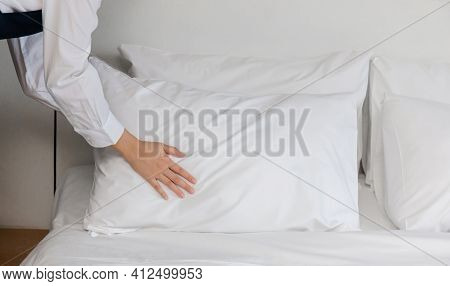 Hotel Room Service Hands Making Bed, Female Chambermaid Making Bed In Hotel Room