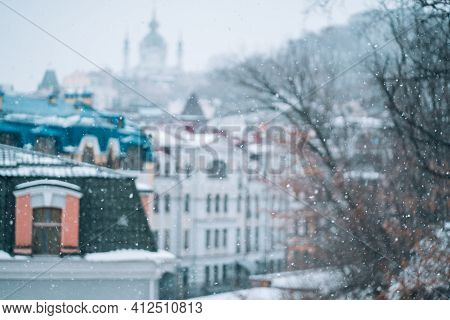 Copious Snowfall Over The City With The Roofs