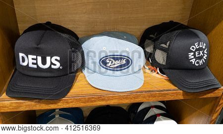 Bordeaux , Aquitaine France - 03 08 2021 : Deus Different Caps For Sale In The Store With Text Logo 