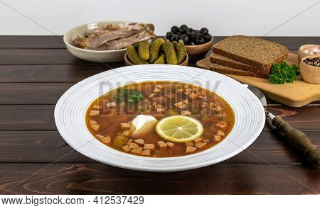 The Plate With Russian Or East European Traditional Soup Solyanka Or Soljanka From The Table. Homema
