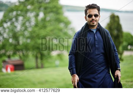Stylish Pakistani Indian Muslim Arabic Man In Kurta Dhoti Suit And Sunglasses.