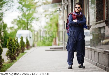 Stylish Pakistani Indian Muslim Arabic Man In Kurta Dhoti Suit And Sunglasses.