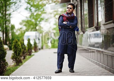 Stylish Pakistani Indian Muslim Arabic Man In Kurta Dhoti Suit And Sunglasses.