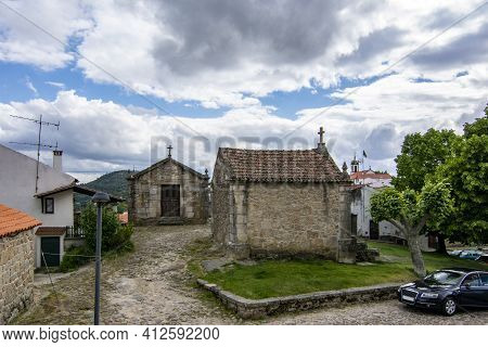 Belmonte, Portugal; May 2017 : Medieval Chapels Of Saint Anthony And Calvary At Belmonte. A Cute Sma