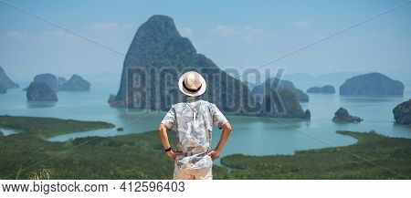 Happy Traveler Man Enjoy Phang Nga Bay View Point, Alone Tourist Standing And Relaxing At Samet Nang