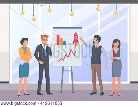 Office Meeting Businessmen Discussing Report. A Man Makes A Sturtup Presentation To Colleagues