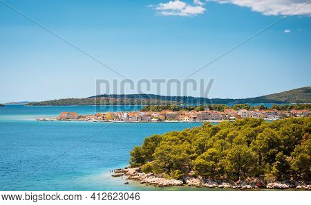 Sunny Shore Of The Adriatic Sea Near Brodarica Coastline, Croatia