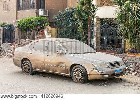 Giza, Egypt - January 26, 2021: Old Abandoned Car Speranza A620 (chery Eastar) In The City Street.