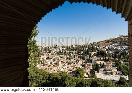 Albayzin District Of Granada, Spain, From A Window In The Alhambra Palace