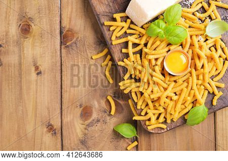 Traditional Pasta Cooked In Chicken Broth , Fresh Pasta. Passatelli In Brodo. A Pasta Formed Of Eggs