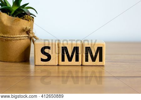 Smm, Social Media Marketing Symbol. Wooden Cubes With Word 'smm - Social Media Marketing' On Beautif