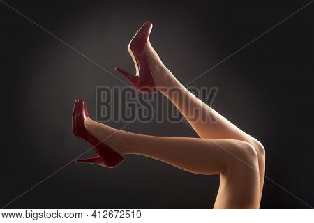 Fashion Shoes. Woman Sexy Feet. Seductive Girl Legs