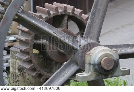 A Gear Or Cog Wheel Made Of Metal, Part Of A Machine