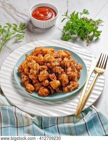 Popcorn Chicken - American Fast Food Dish Of Bite-sized Chicken Pieces Breaded And Fried, Served On 