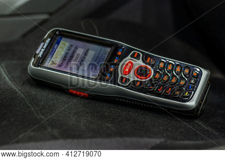 Moscow, Russia - December 16, 2020 Yolka Wms Barcode Scanner On Reach Truck Chair Close Up View. Yol