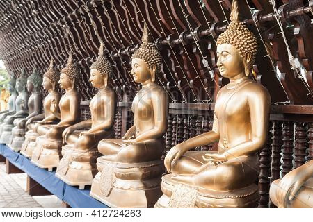 Buddha Statues At The Seema Malaka Buddhist Temple On Beira Lake,  Colombo, Sri Lanka. Seema Malaka 