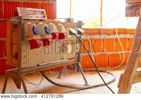 Distribution Panel With Industrial Multiphase Power Plugs And Sockets Is Providing Electrical Energy