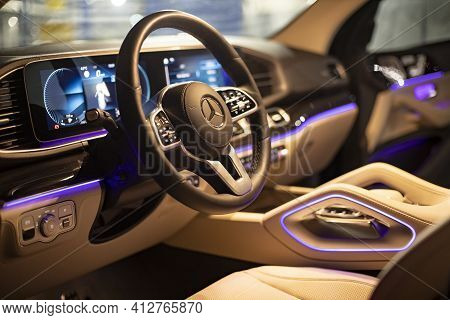 Moscow, Russia - December 24, 2019: Empty Interior Of Driver's Seat With Steering Wheel Of Light Lea