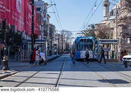 March 8, 2021 In Istanbul - Turkey Cemberlitas Square And Column. People And Mosques In The Historic