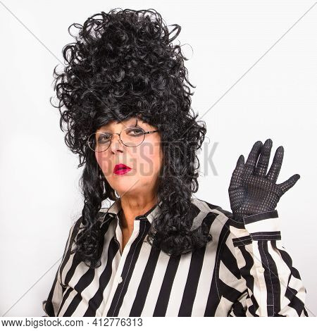 Aristocratic Woman In Black Baroque Wig, Black-white Striped Clothes And Eyeglasses Ready To Party.