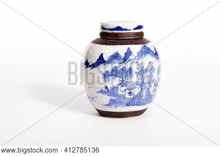 Old Antique Blue And White Ceramic Vase Isolated On White Background.