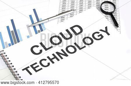 In The Notebook, The Text Cloud Technology , Next To Magnifier And Pen, The Background Is Graphics.