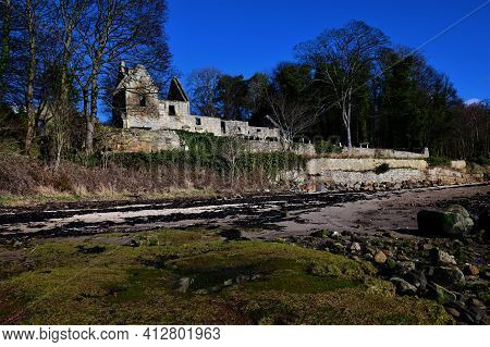 A view of the ruins of the medieval stone church building of St. Bridgets on the shoreline at Dalget