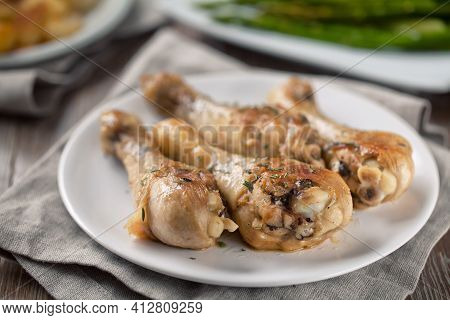 Roast Chicken On A Plate. High Quality Photo.