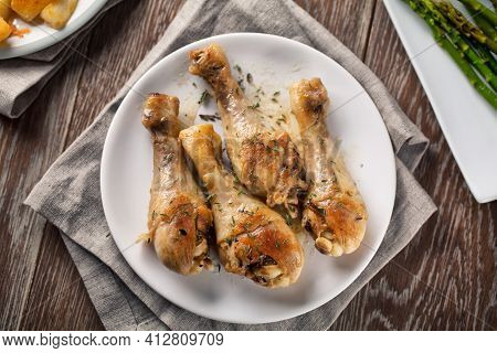 Roast Chicken On A Plate. High Quality Photo.