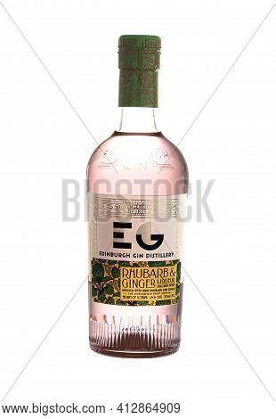Swindon, Uk - March 17, 2021: Bottle Of Edinburgh Gin Rhubarb And Ginger  Liqueur On A White Backgro