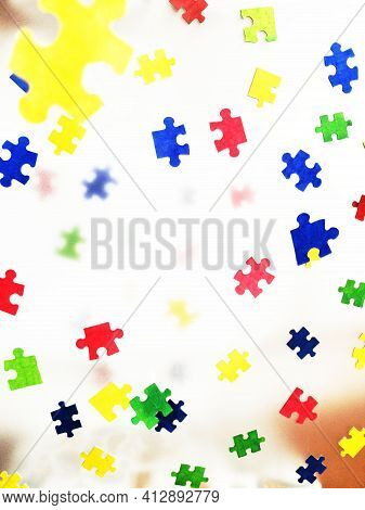 April 2, World International Autism Day. White Postcard On The Background Of Colorful Puzzles. The S