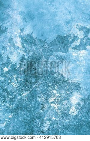 Textured Blue Stucco Background With Scratches, Scuffs And Stains. Plaster Backdrop Of Marine Color 